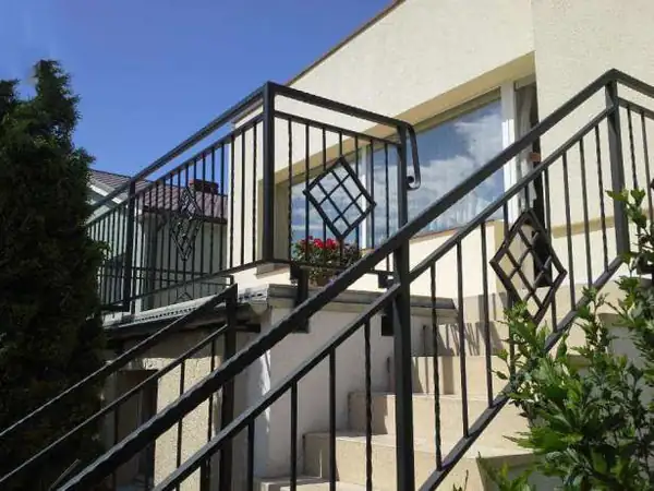 Balustrady zewnętrzne kute — realizacja 54, Kowalstwo Artystyczne Marek Mida
